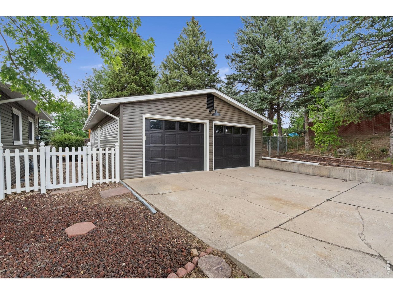 1118 Ridgelawn Drive Fort Collins, CO 80521 - Photo 31 of 48 Four Car Garage has room for all your needs