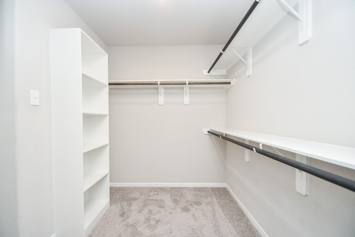 17811 Chartertree Lane Tomball, TX 77377 - Photo 21 of 32 a view of an empty walk in closet