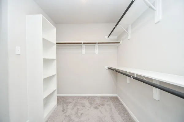 a view of an empty walk in closet