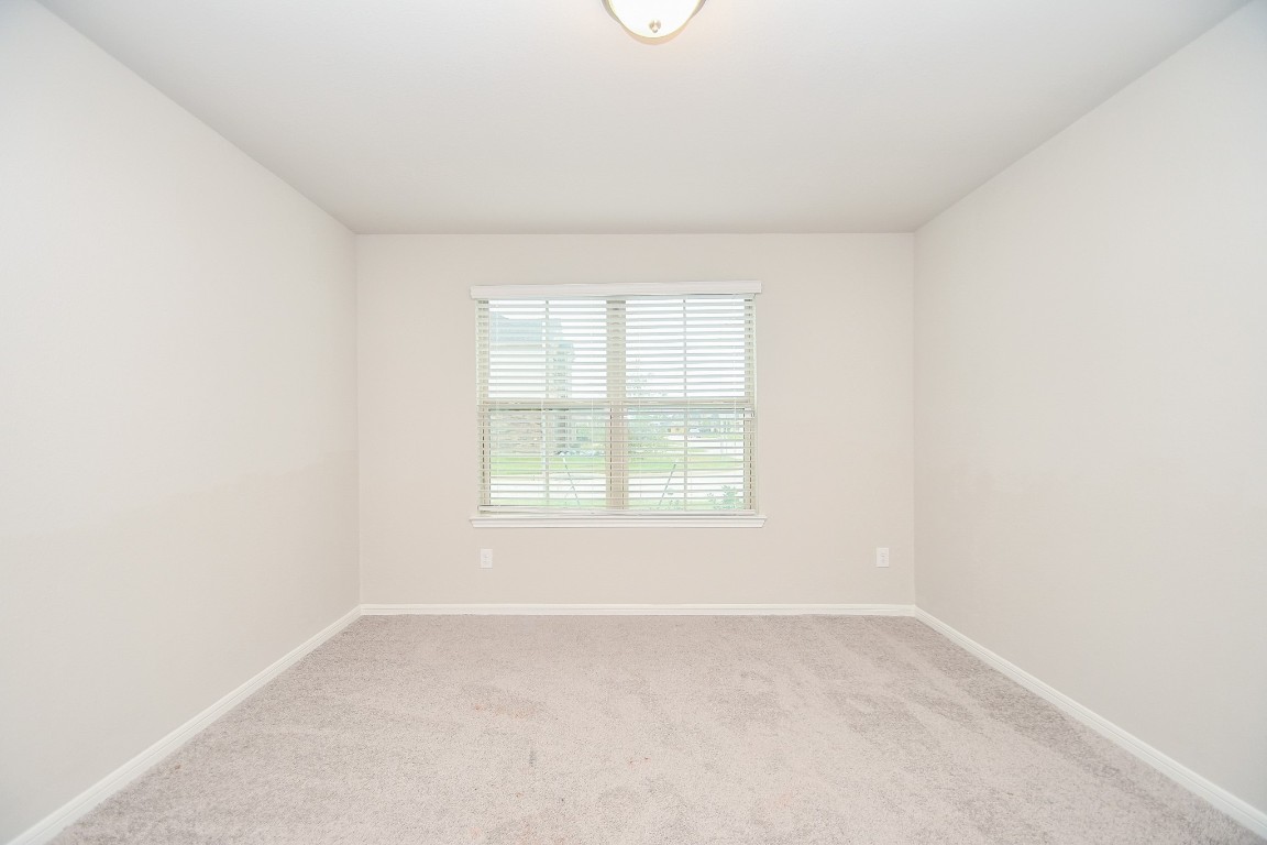 17811 Chartertree Lane Tomball, TX 77377 - Photo 22 of 32 an empty room with a window
