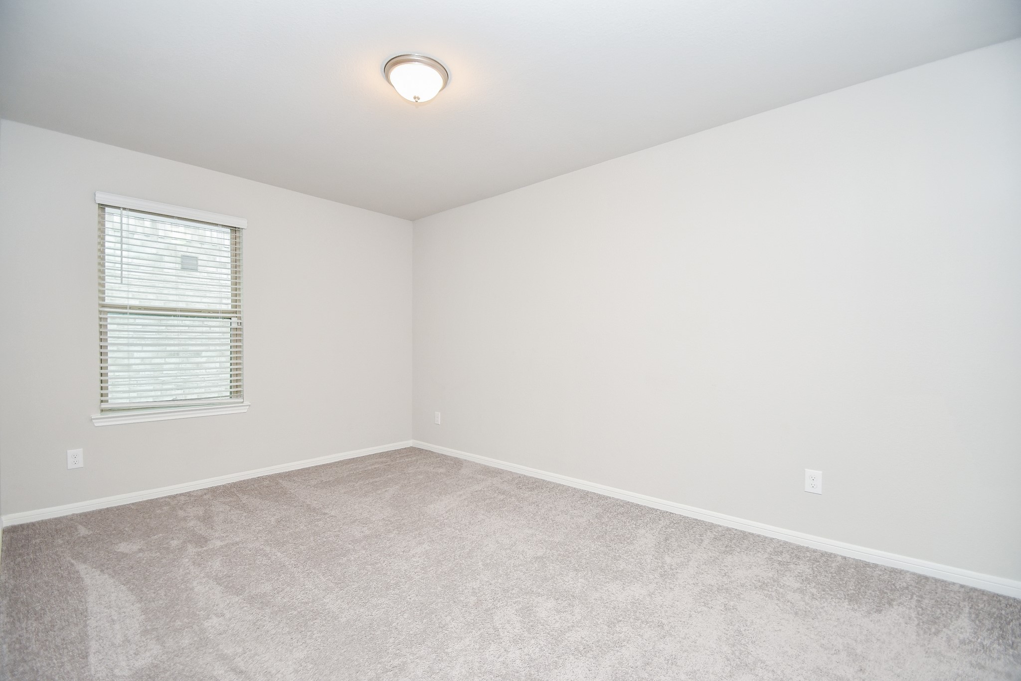 17811 Chartertree Lane Tomball, TX 77377 - Photo 25 of 32 an empty room with a window