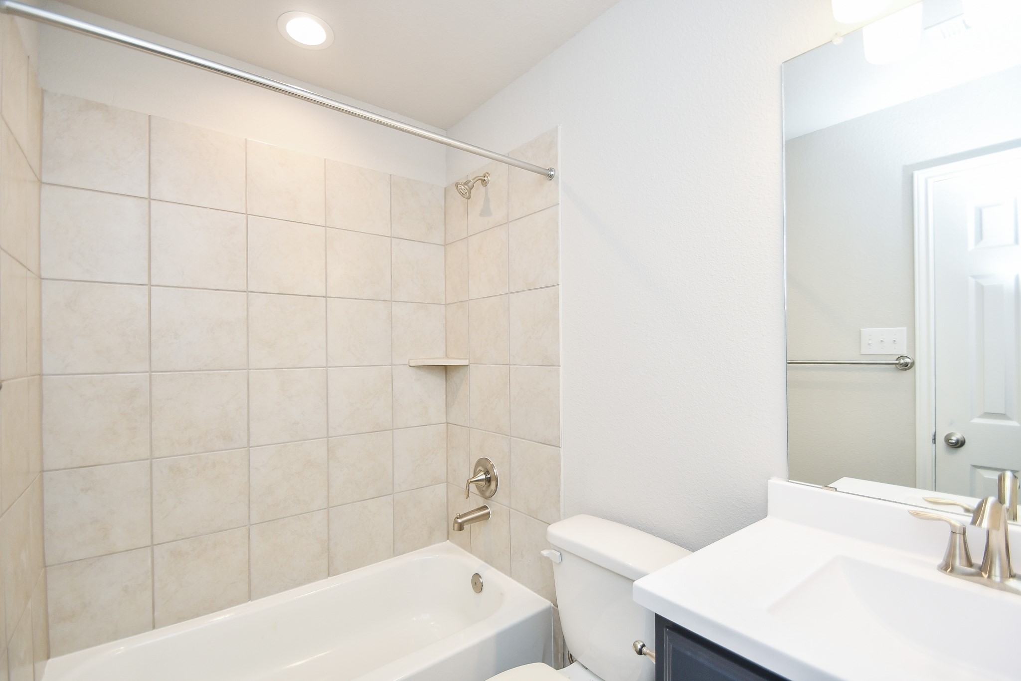 17811 Chartertree Lane Tomball, TX 77377 - Photo 26 of 32 a bathroom with a sink a toilet and shower