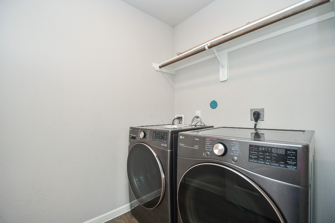17811 Chartertree Lane Tomball, TX 77377 - Photo 30 of 32 a utility room with dryer and washer