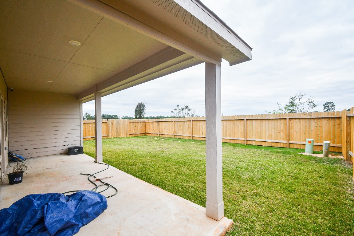 17811 Chartertree Lane Tomball, TX 77377 - Photo 31 of 32 a view of a backyard with swimming pool