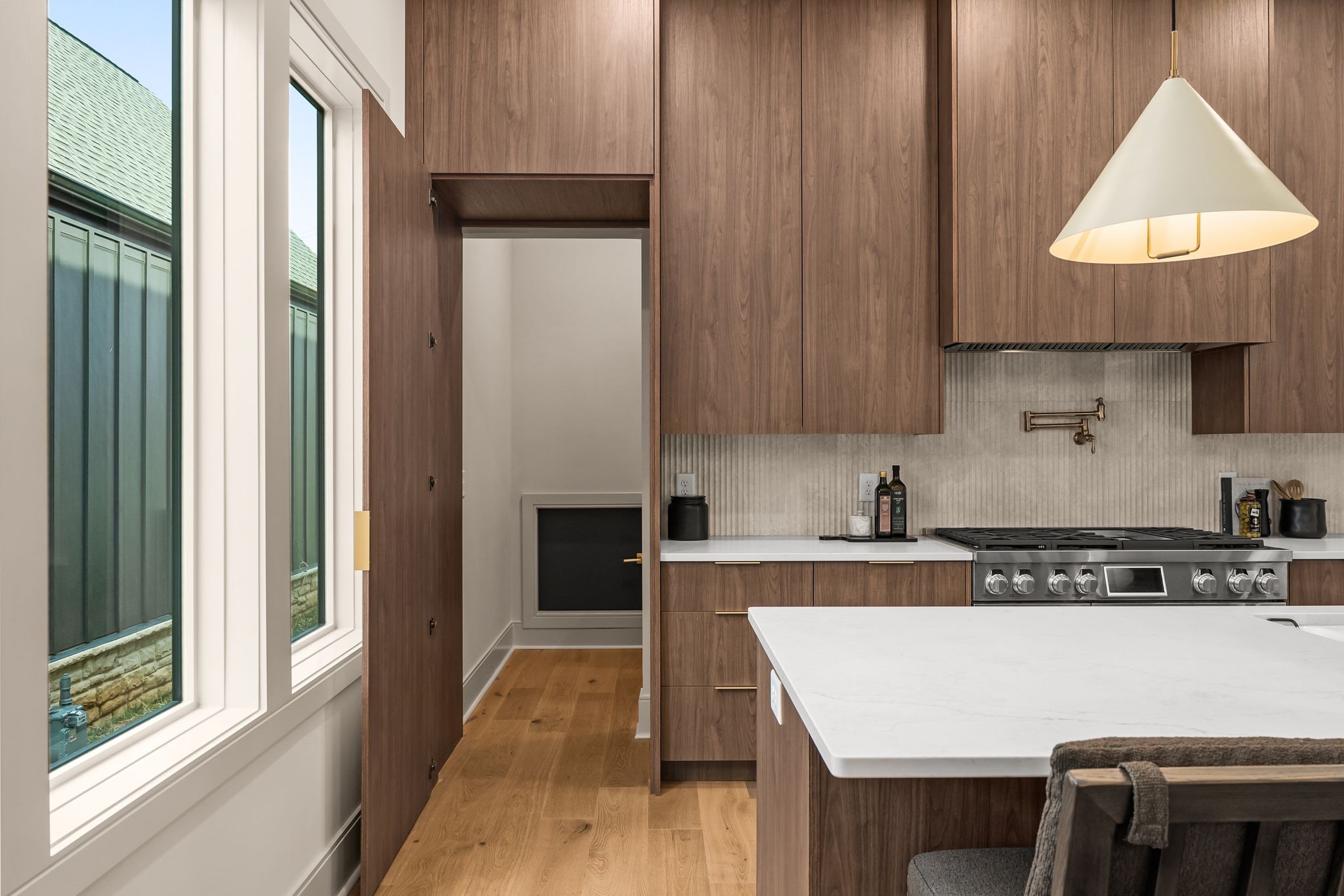 2306 Riverside Drive Nashville, TN 37216 - Photo 11 of 44 a kitchen with stainless steel appliances a stove a sink refrigerator and cabinets