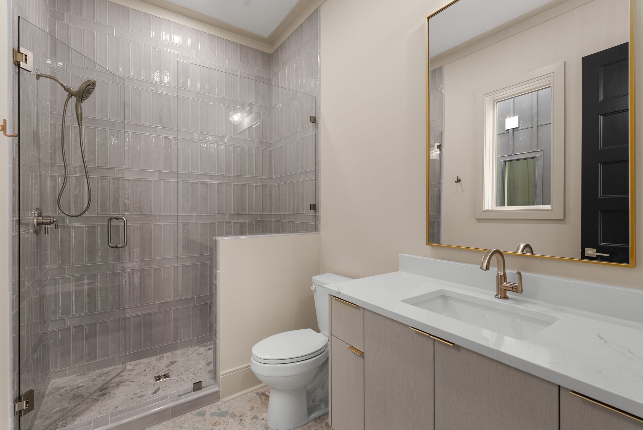 2306 Riverside Drive Nashville, TN 37216 - Photo 22 of 44 a bathroom with a shower sink vanity mirror and toilet