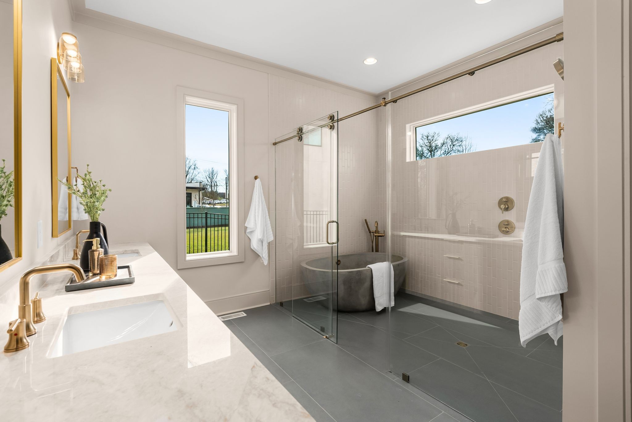 2306 Riverside Drive Nashville, TN 37216 - Photo 26 of 44 a bathroom with a tub sink and mirror