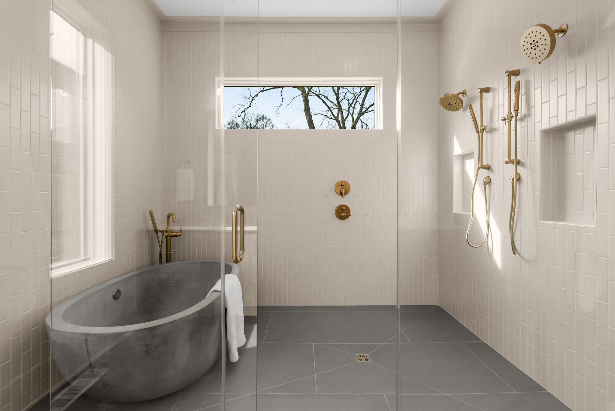 2306 Riverside Drive Nashville, TN 37216 - Photo 28 of 44 a bathroom with a bathtub and window