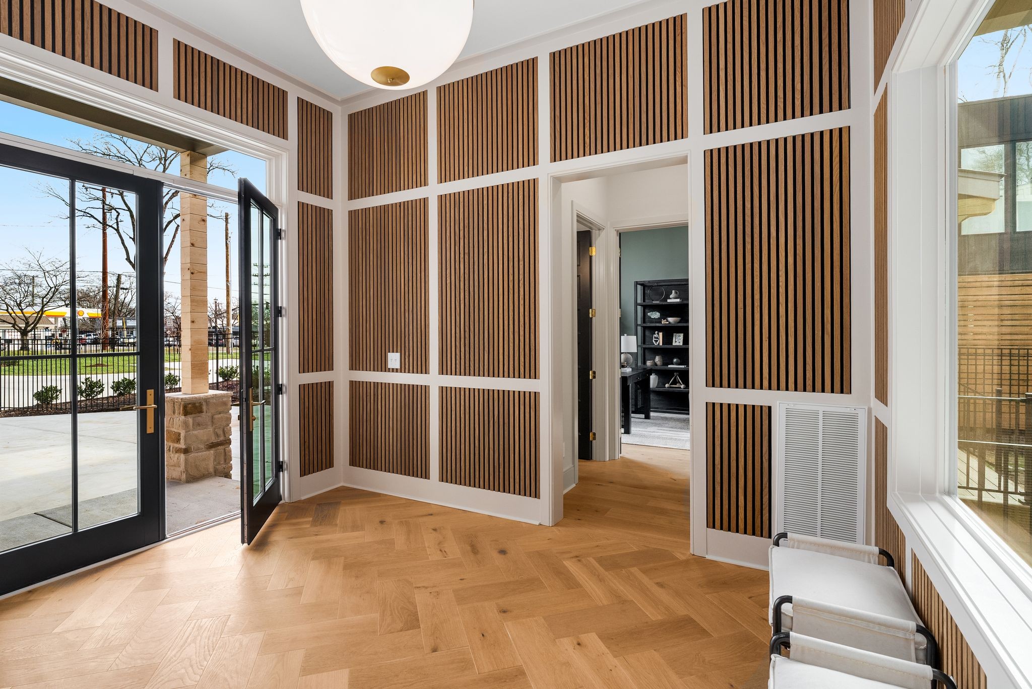 2306 Riverside Drive Nashville, TN 37216 - Photo 3 of 44 a view of a hallway with wooden floor and windows