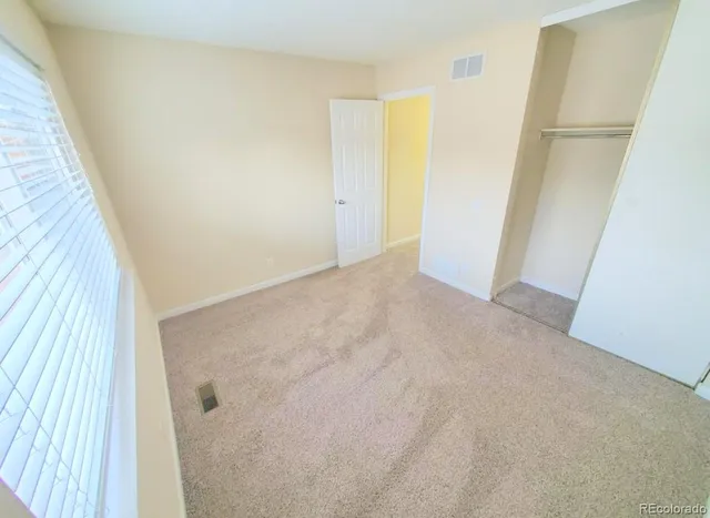 a view of garage and yard