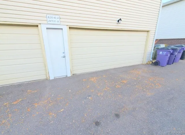 a view of a park with large trees