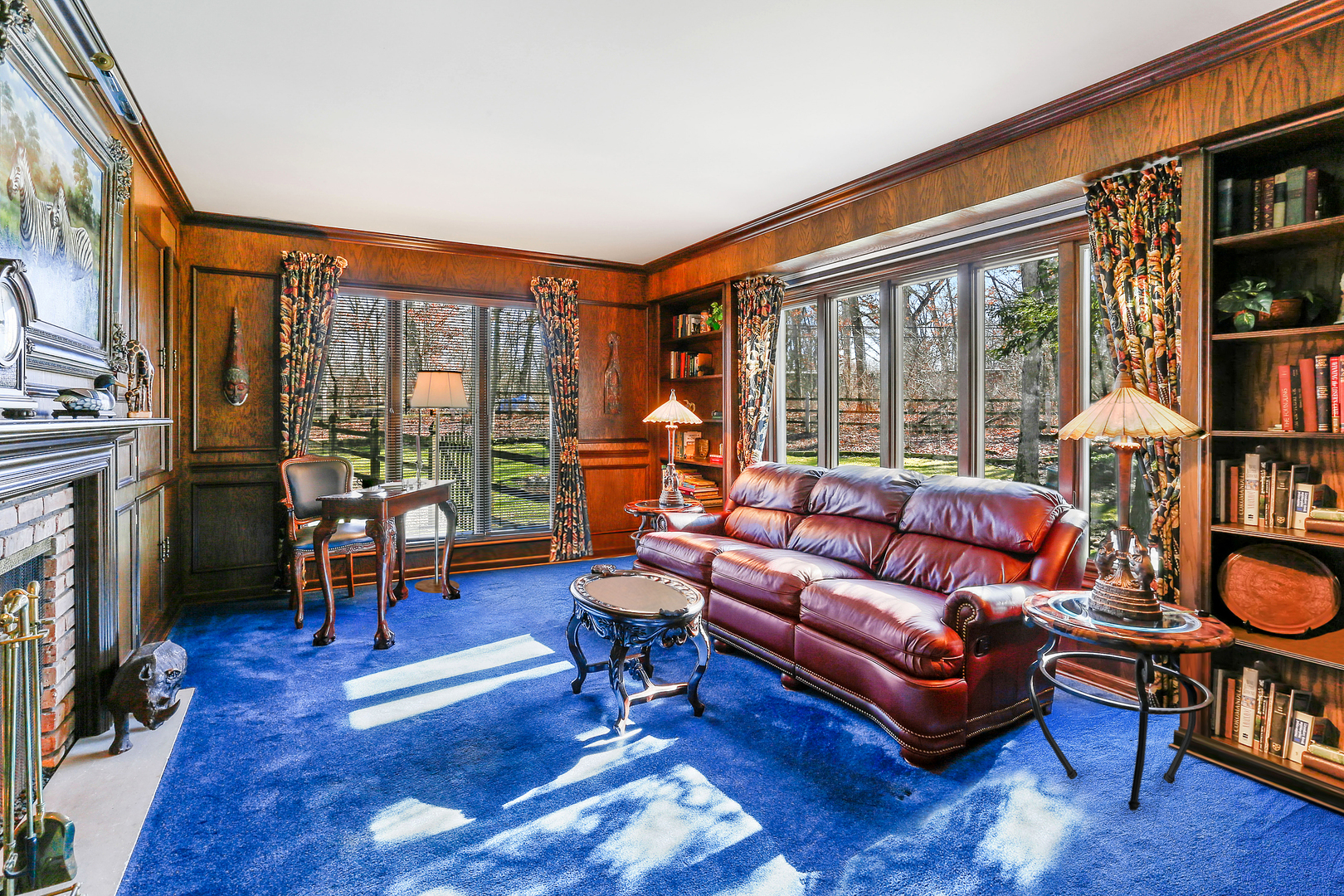 43 Ramsgate Drive Palos Park, IL 60464 - Photo 27 of 50 a living room with furniture a bookshelf and a large window