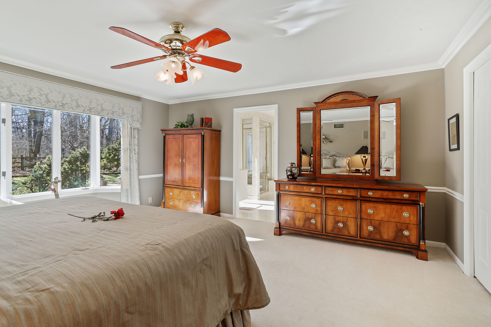 43 Ramsgate Drive Palos Park, IL 60464 - Photo 29 of 50 a bedroom with a large bed and a large dresser