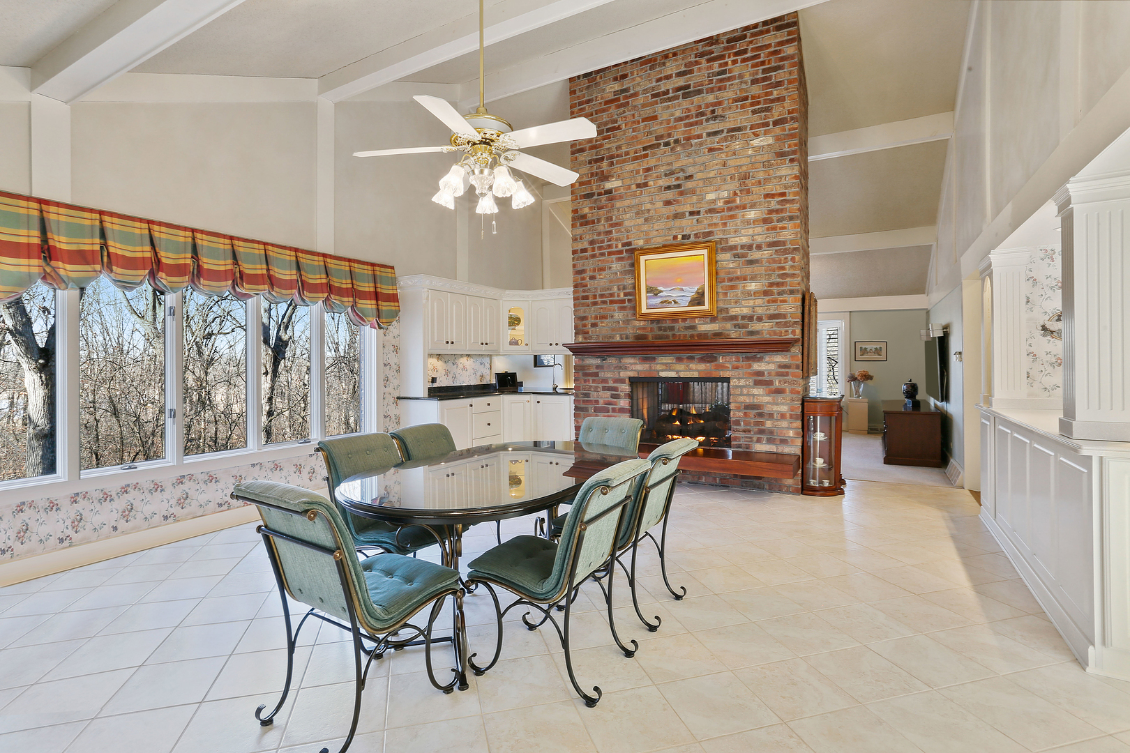43 Ramsgate Drive Palos Park, IL 60464 - Photo 39 of 50 a dining room with furniture a fireplace and a chandelier