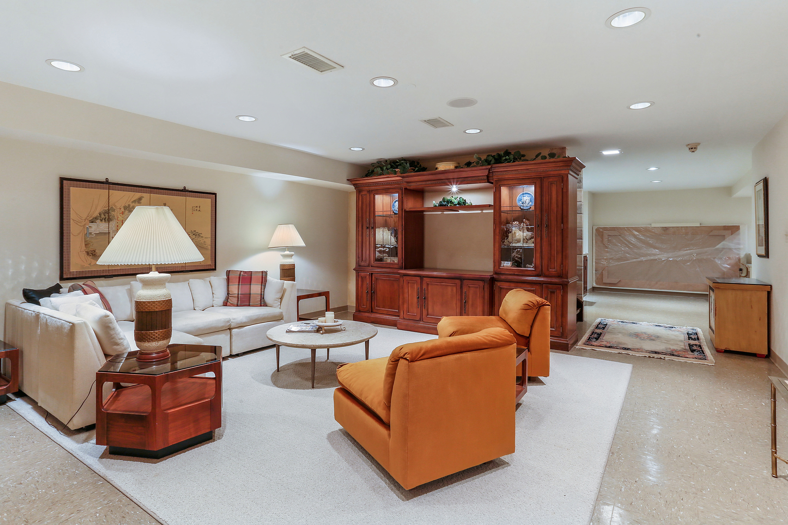 43 Ramsgate Drive Palos Park, IL 60464 - Photo 48 of 50 a living room with furniture a flat screen tv and a floor to ceiling window