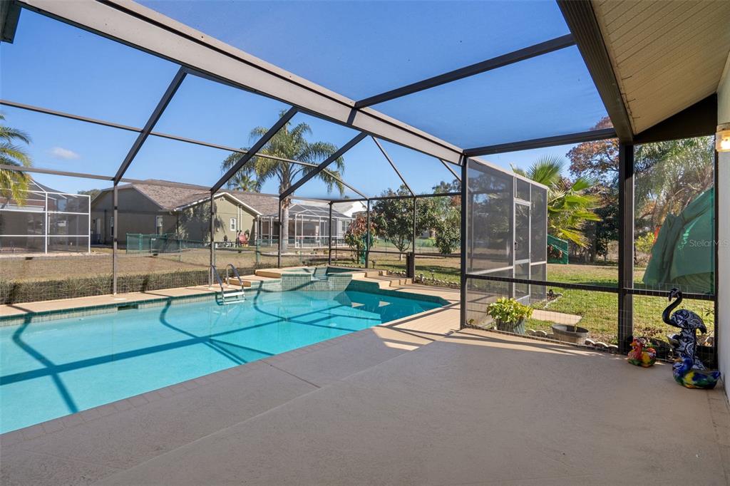 10421 Templewood Court Spring Hill, FL 34608 - Photo 53 of 63 a view of outdoor space with porch and garden