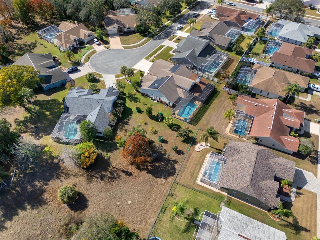 10421 Templewood Court Spring Hill, FL 34608 - Photo 61 of 63 an aerial view of residential houses with outdoor space