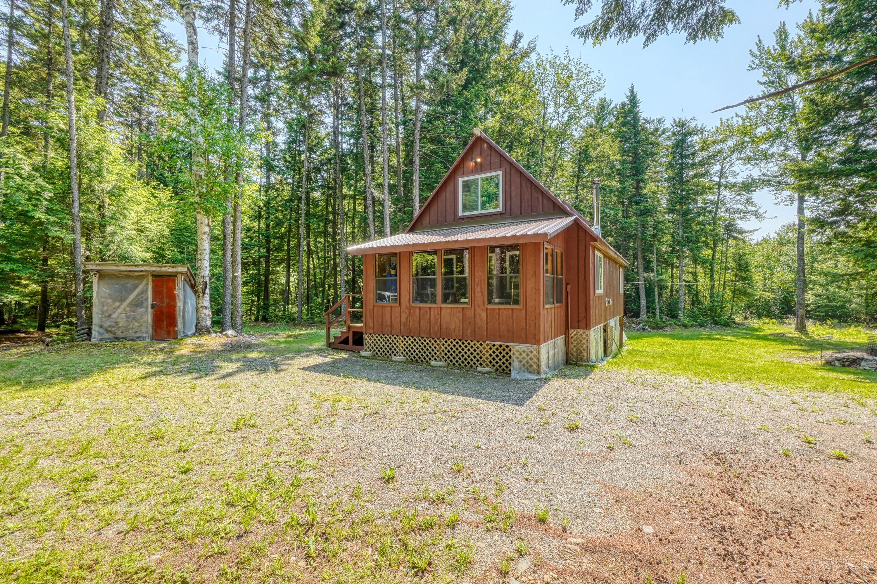 659 Sandy Beach Road Danforth, ME 04424 - Photo 6 of 27 Front and Right Side Wide View