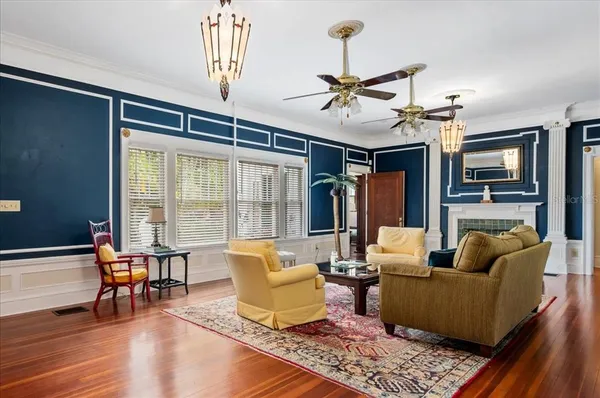 a view of a dining room with furniture and window