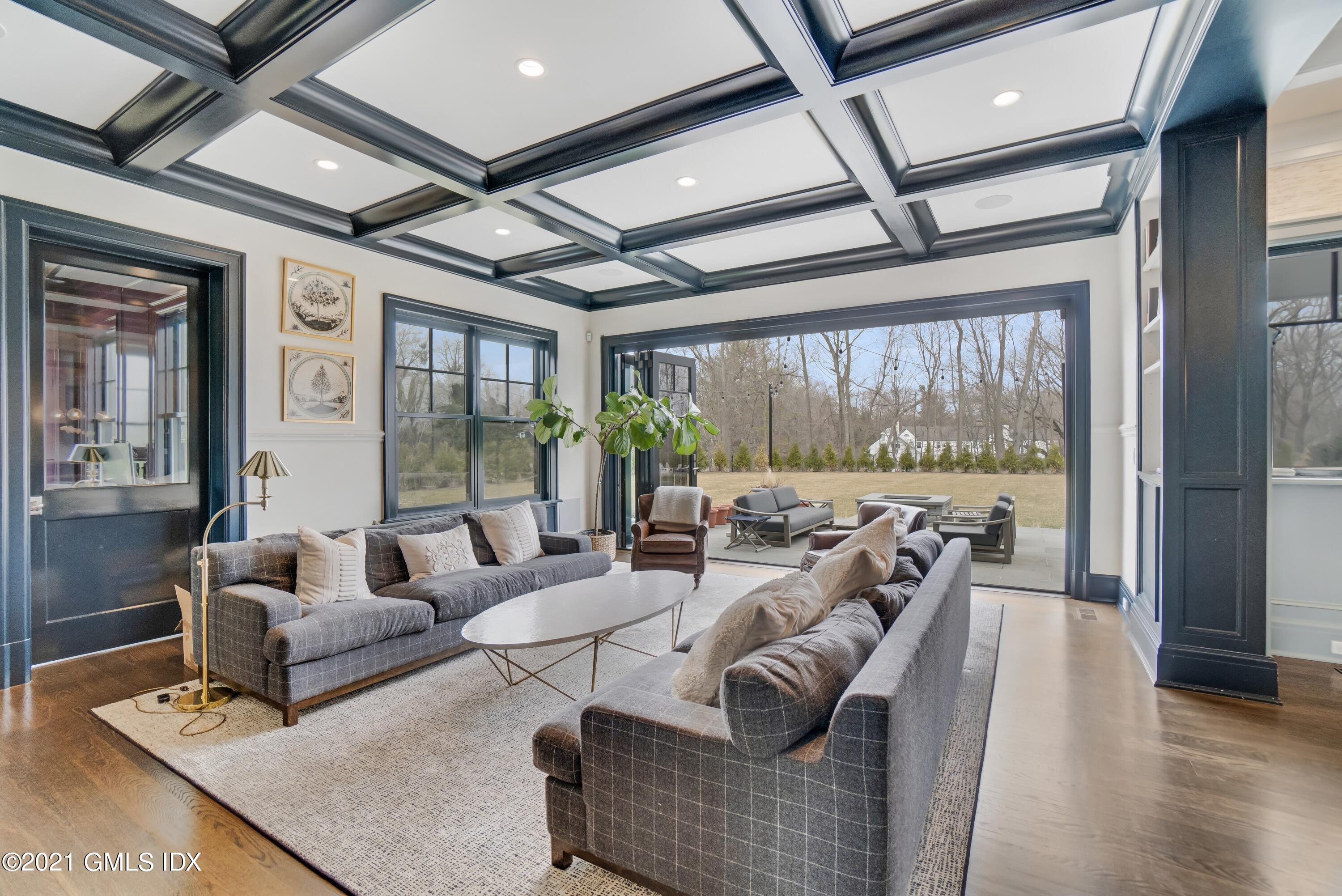 7 Turner Drive Greenwich, CT 06831 - Photo 12 of 34 a living room with furniture and a large window