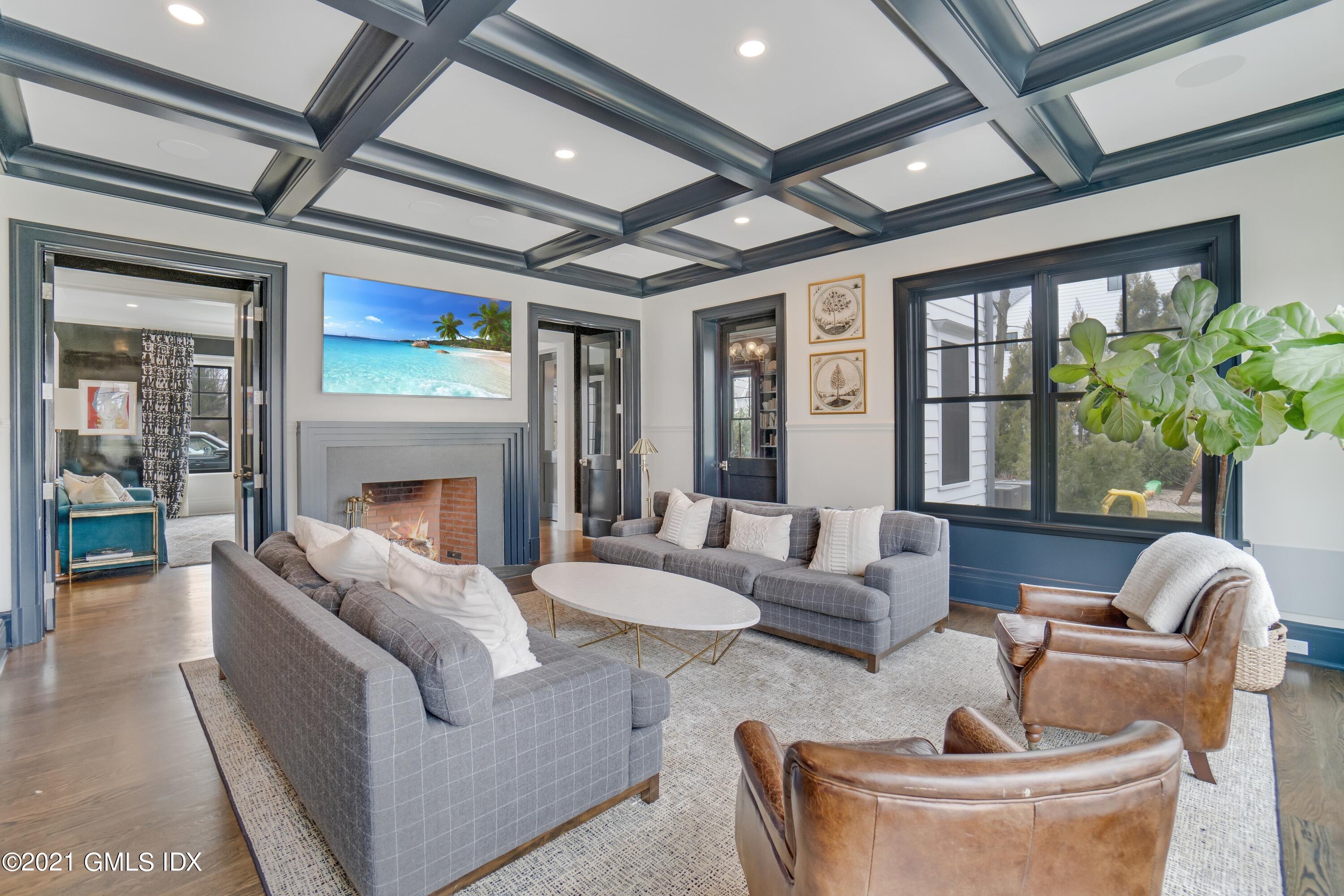 7 Turner Drive Greenwich, CT 06831 - Photo 14 of 34 a living room with furniture and a fireplace