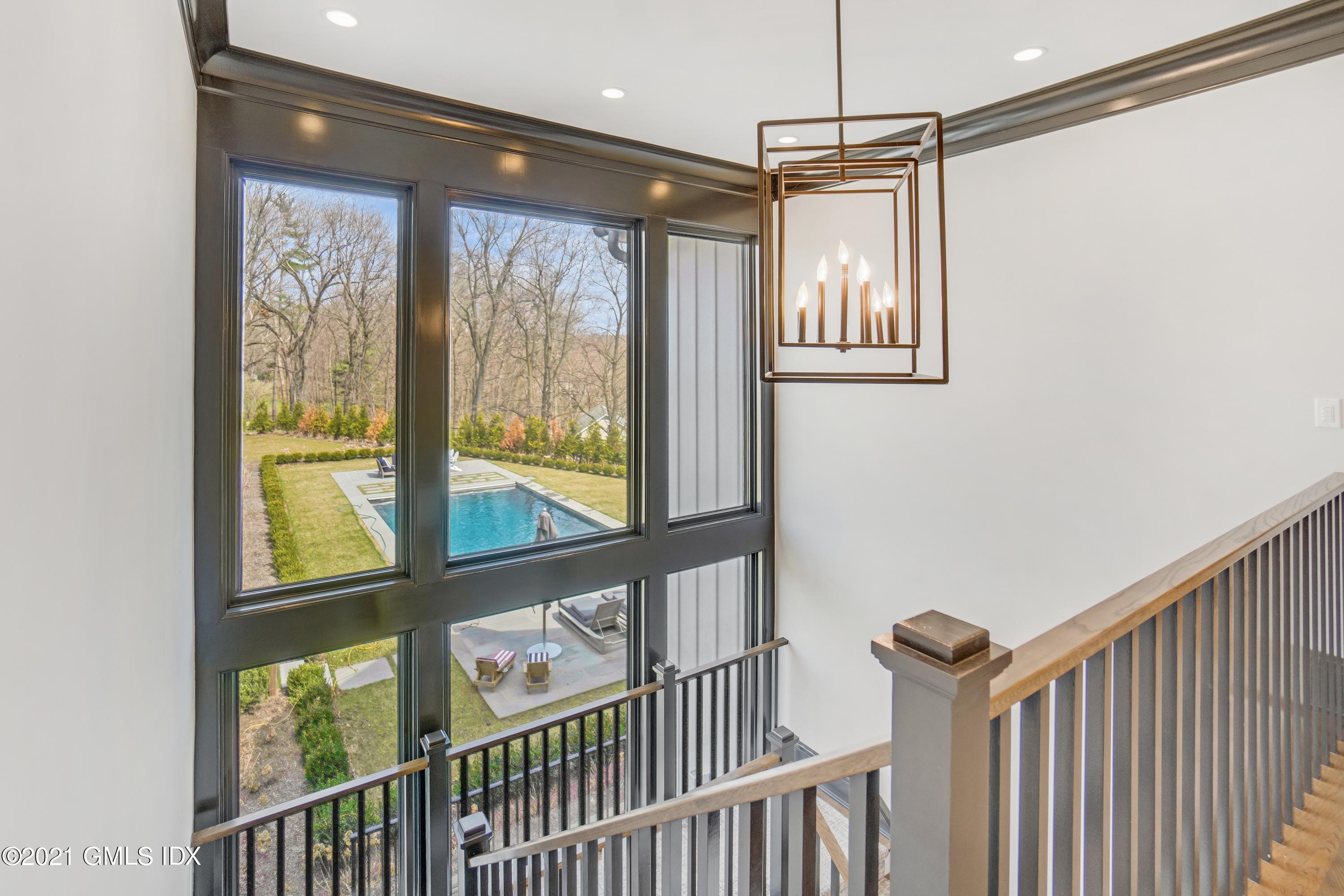 7 Turner Drive Greenwich, CT 06831 - Photo 21 of 34 a view of a room with wooden floor and windows