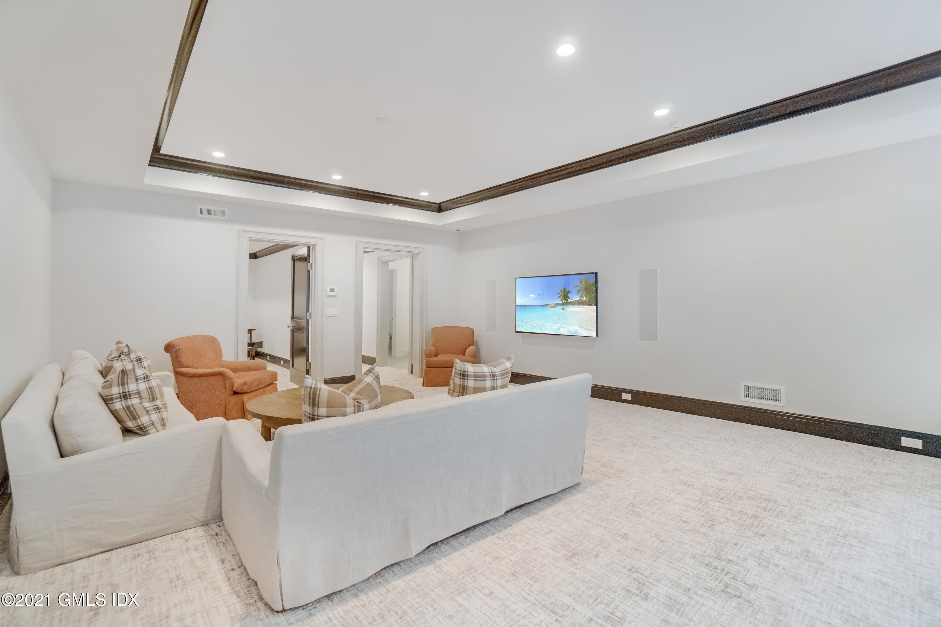 7 Turner Drive Greenwich, CT 06831 - Photo 31 of 34 a living room with furniture and a window
