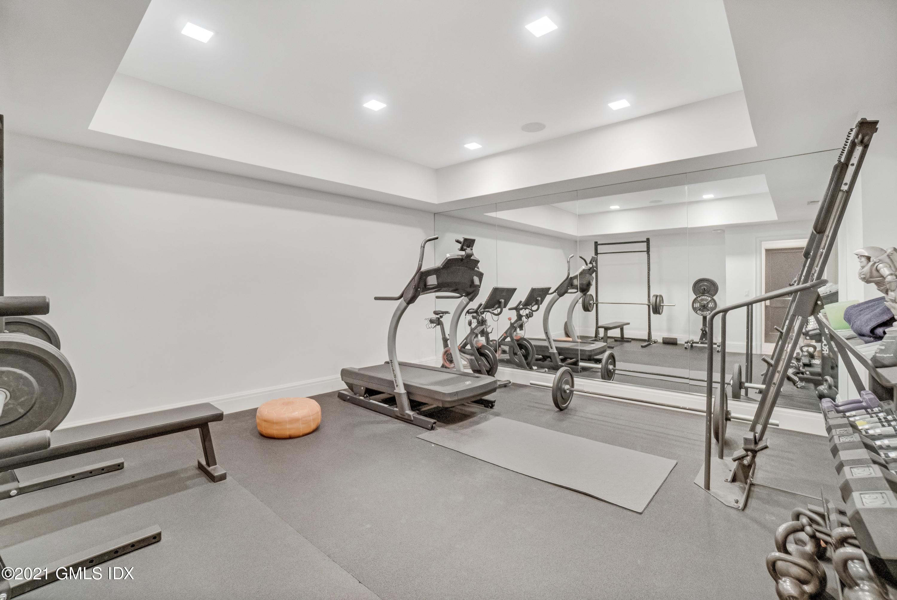 7 Turner Drive Greenwich, CT 06831 - Photo 32 of 34 a view of a room with gym equipment