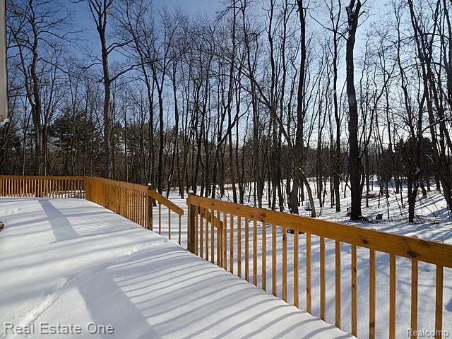 7555 Rattalee Lake Road Clarkston, MI 48348 - Photo 34 of 41 Large (new) deck, private and great for entertaining.