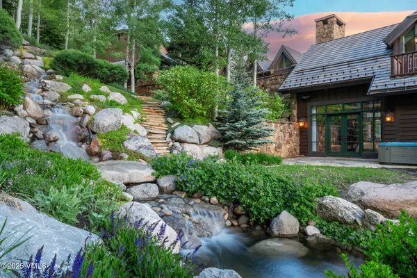 a view of a house with a garden