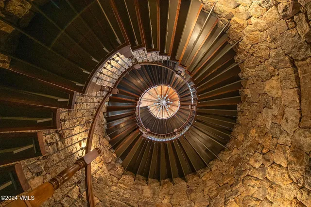 a view of a town with mountains in the background