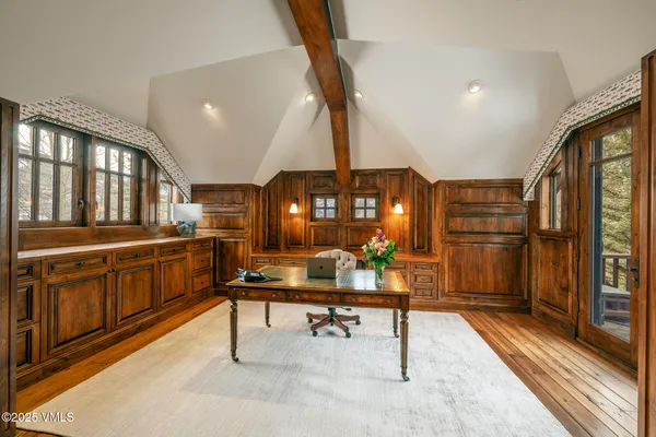 a view of a kitchen with furniture and a fireplace