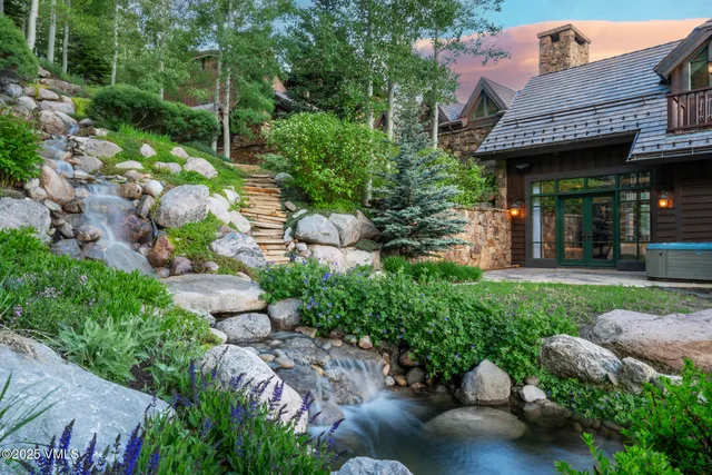 a view of a house with a garden