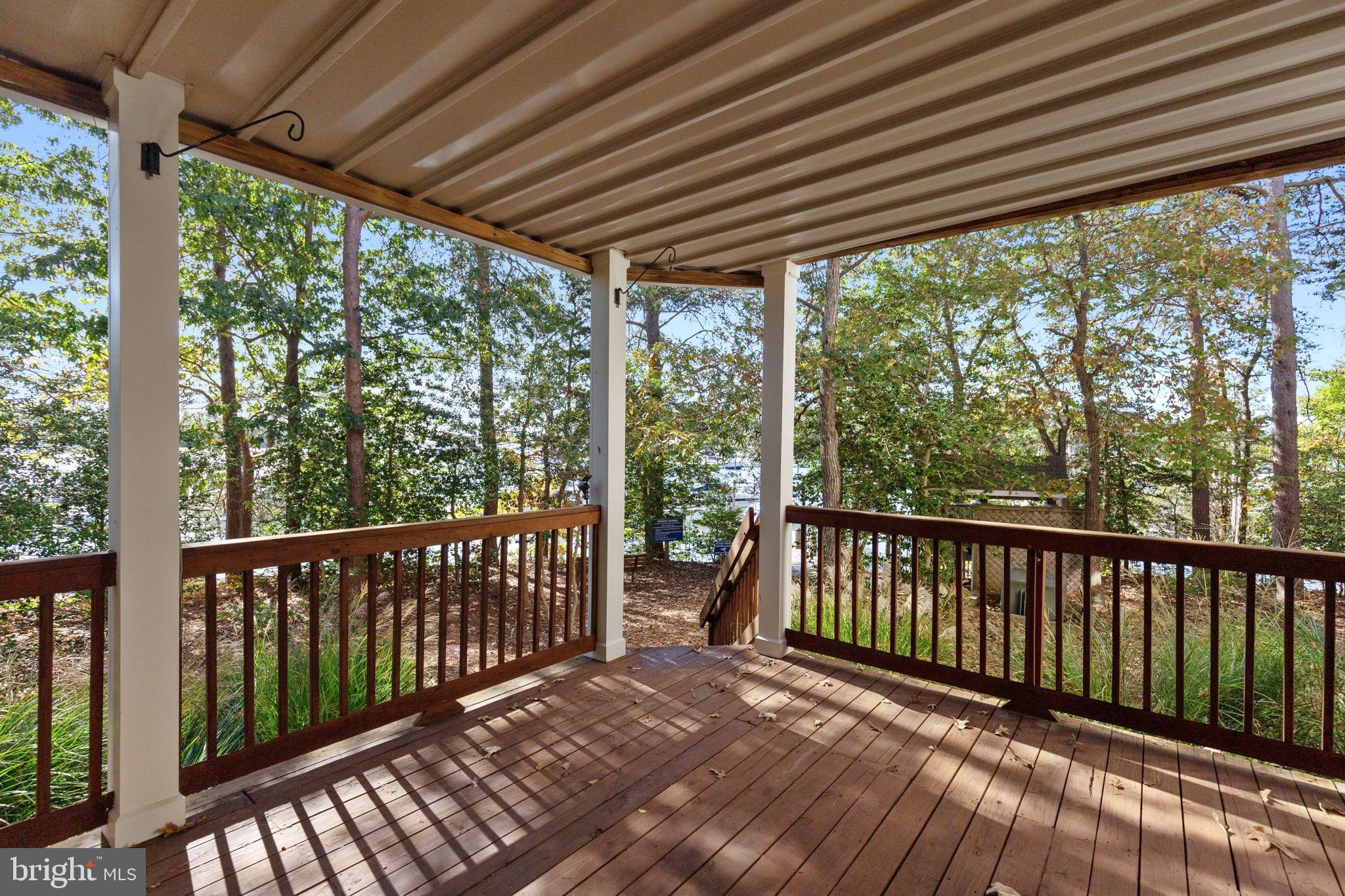 605 Runabout Loop Solomons, MD 20688 - Photo 2 of 31 Large deck overlooking the water