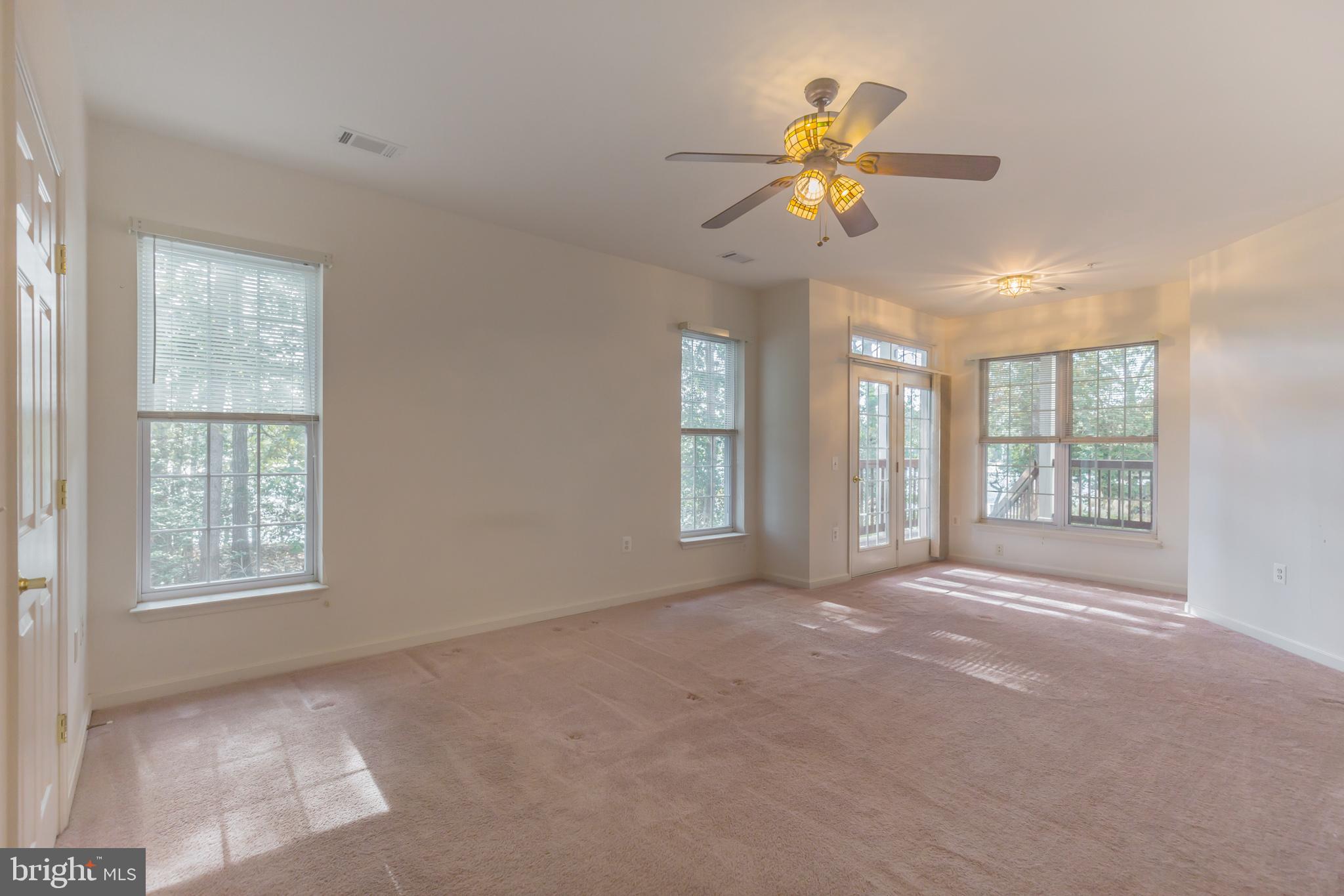 605 Runabout Loop Solomons, MD 20688 - Photo 19 of 31 Master bedroom overlooks the water