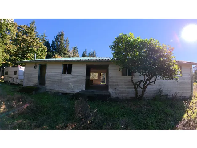 a black and white photo of a house