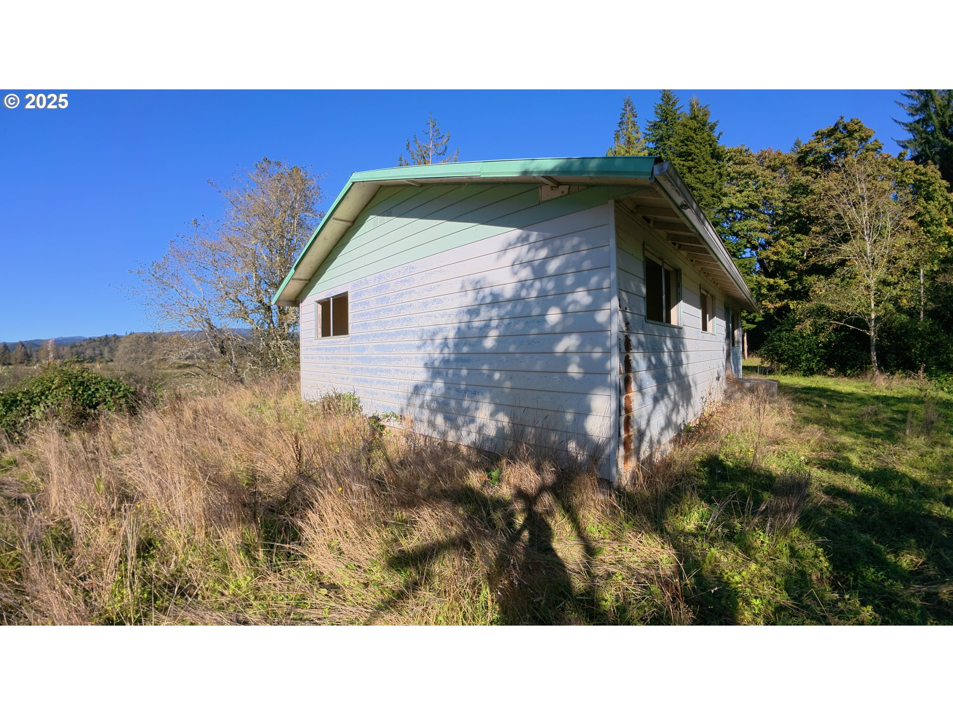 105 East Valley Road Skamokawa, WA 98647 - Photo 16 of 29 a black and white photo of a house