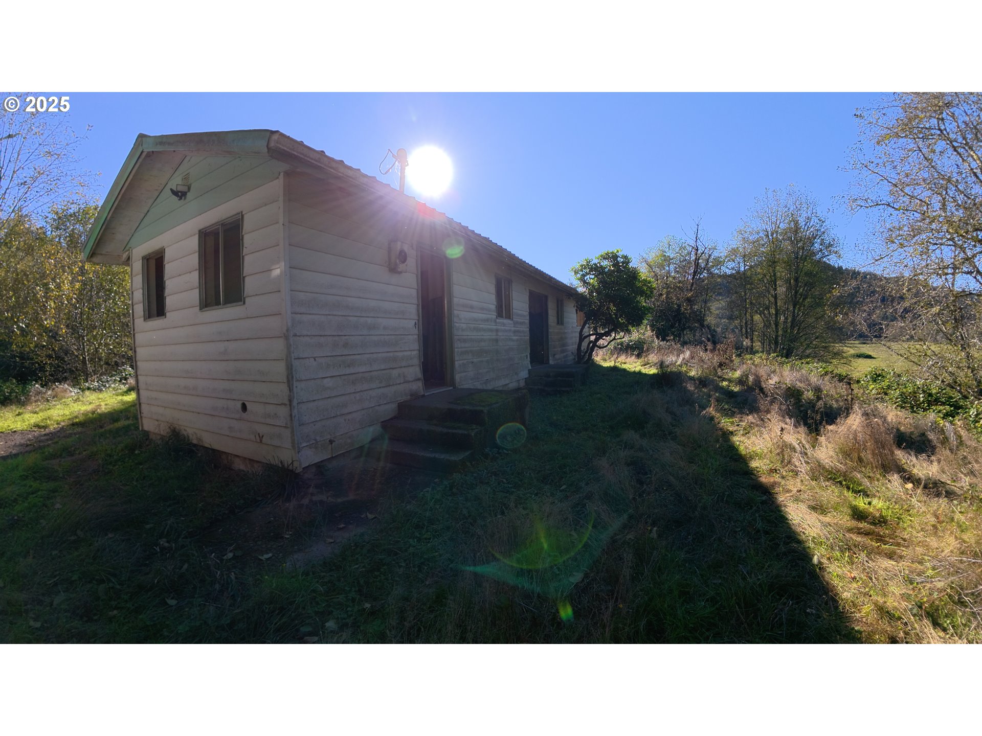 105 East Valley Road Skamokawa, WA 98647 - Photo 20 of 29 a black and white photo of a building