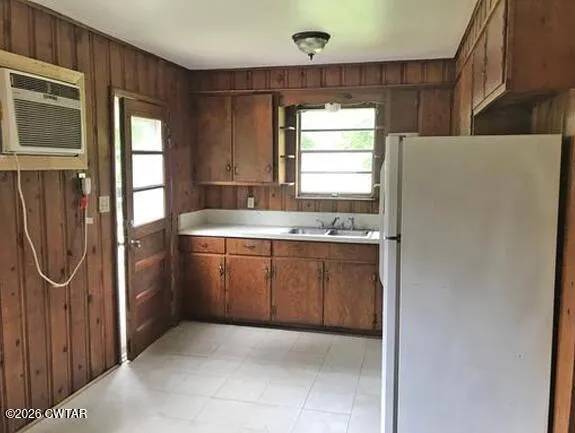 a utility room with washer and dryer