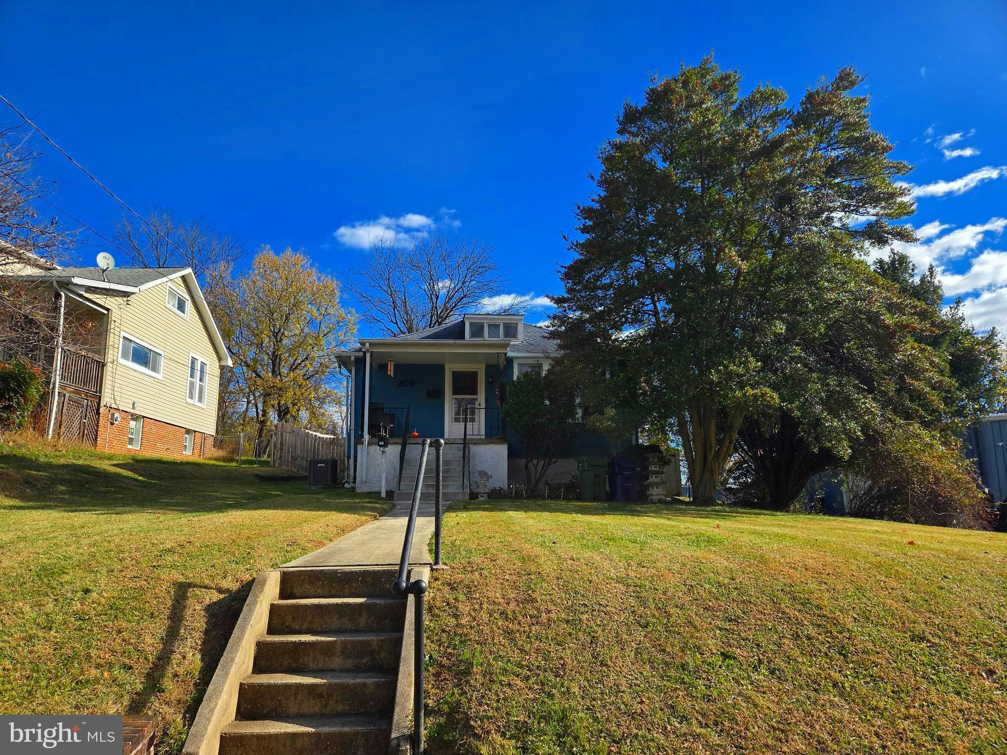 209 South Rock Glen Road Baltimore, MD 21229 - Photo 1 of 21 Front of Home (Side walk view)