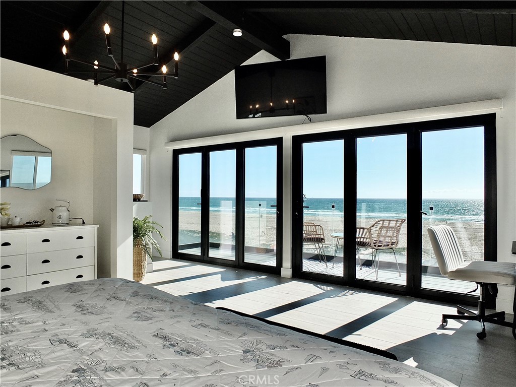 16765 South Pacific Avenue, Unit B' Huntington Beach, CA 90742 - Photo 20 of 45 a living room with a large window