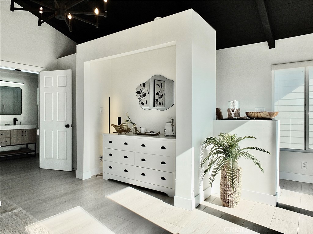 16765 South Pacific Avenue, Unit B' Huntington Beach, CA 90742 - Photo 23 of 45 a view of a livingroom with furniture and kitchen