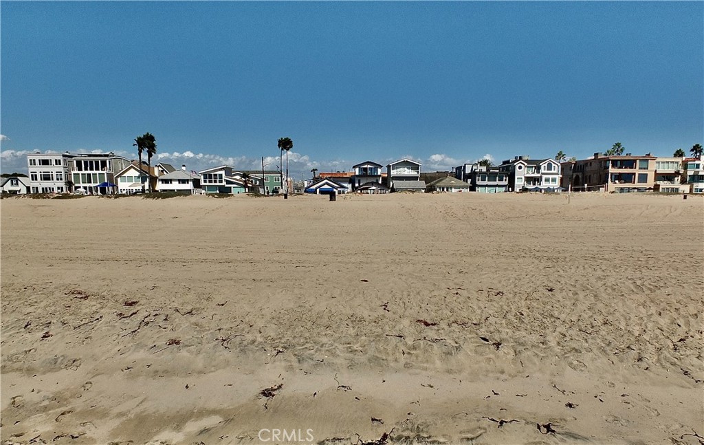 16765 South Pacific Avenue, Unit B' Huntington Beach, CA 90742 - Photo 43 of 45 a view of building with ocean view