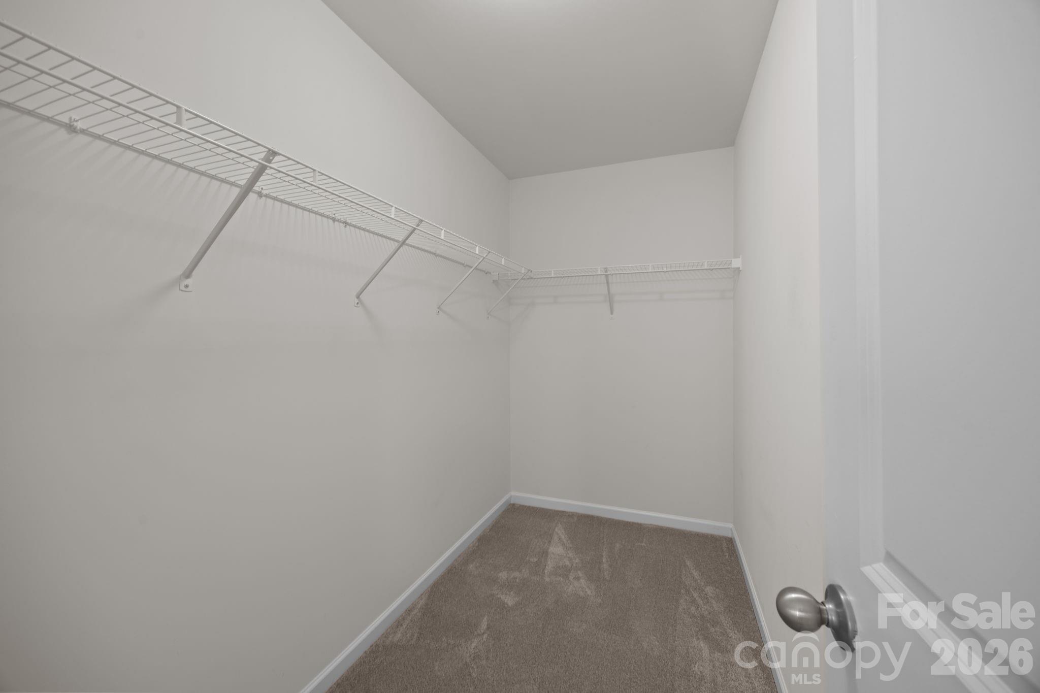 116 Rippling Water Drive Mount Holly, NC 28120 - Photo 33 of 48 a view of a rack on the wall