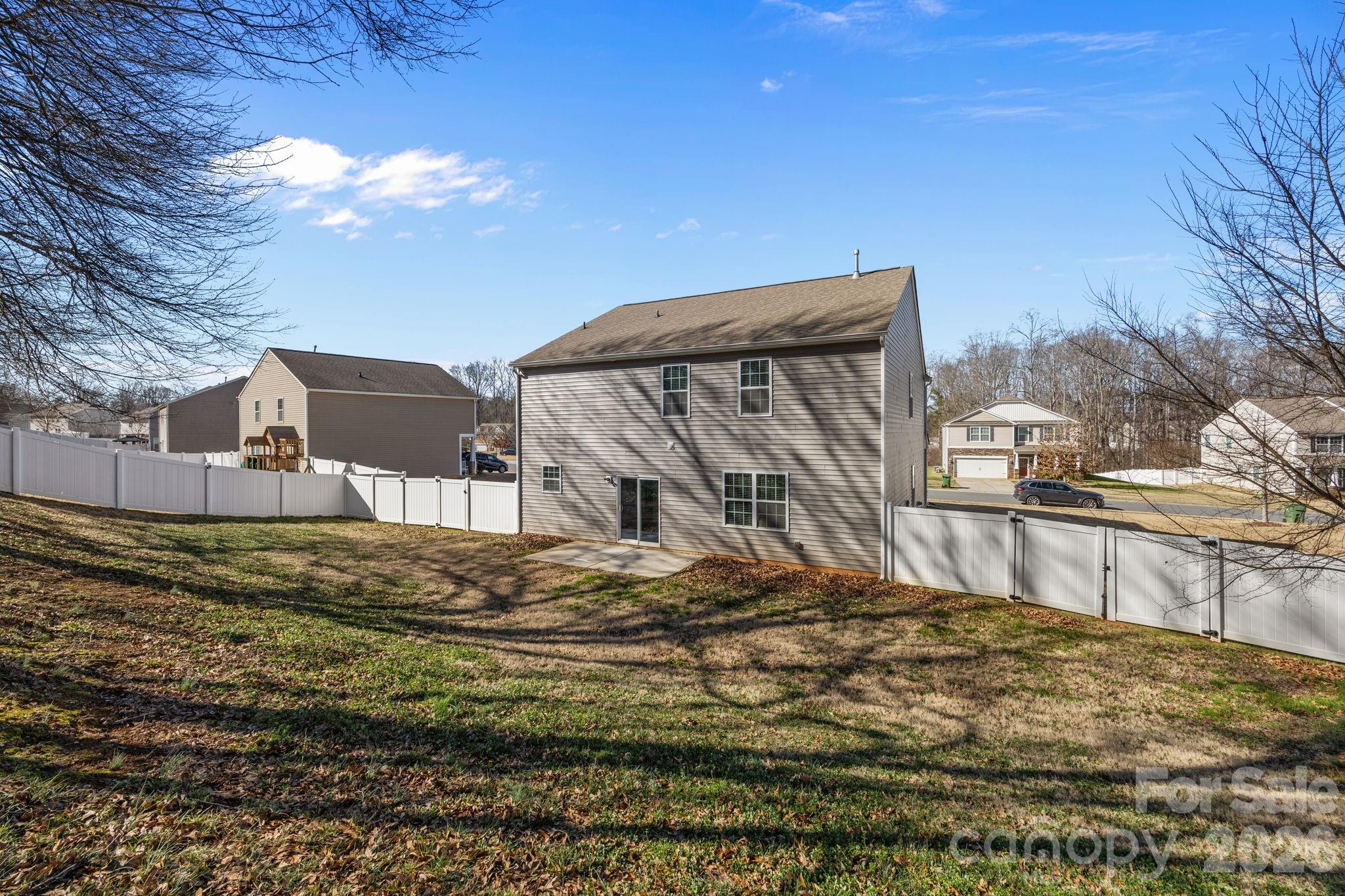 116 Rippling Water Drive Mount Holly, NC 28120 - Photo 40 of 48 a view of a house with a snow