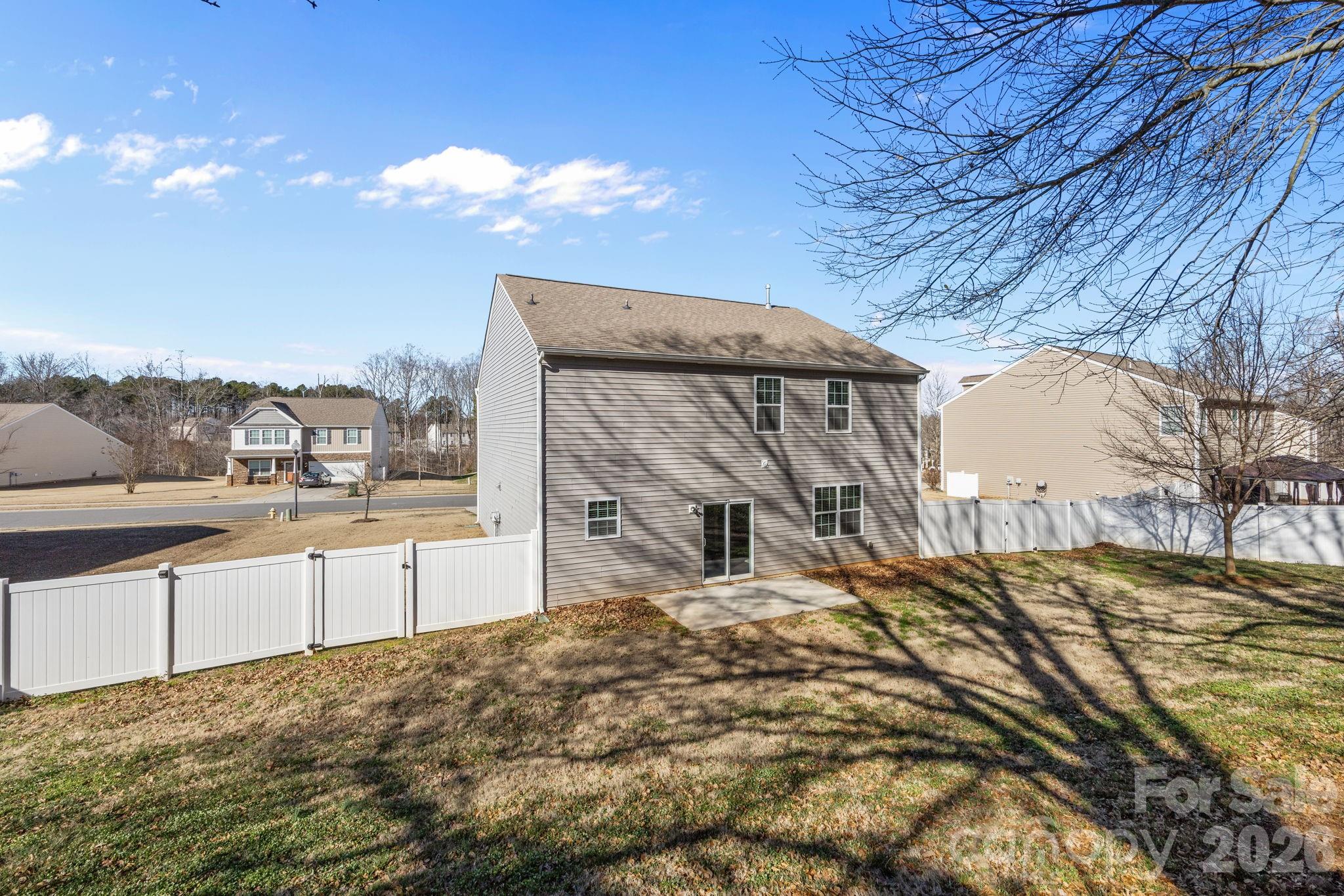 116 Rippling Water Drive Mount Holly, NC 28120 - Photo 41 of 48 a view of a house with a snow
