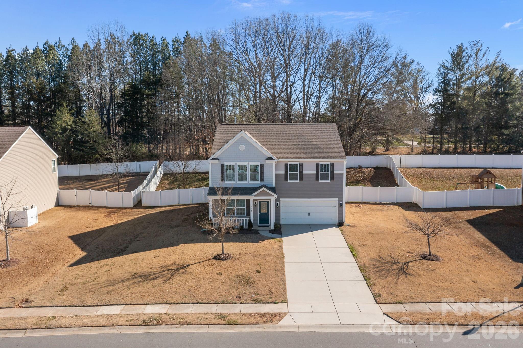 116 Rippling Water Drive Mount Holly, NC 28120 - Photo 46 of 48 a view of a house with swimming pool and sitting area