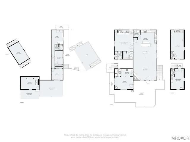 a large kitchen with stainless steel appliances a large counter top and a stove