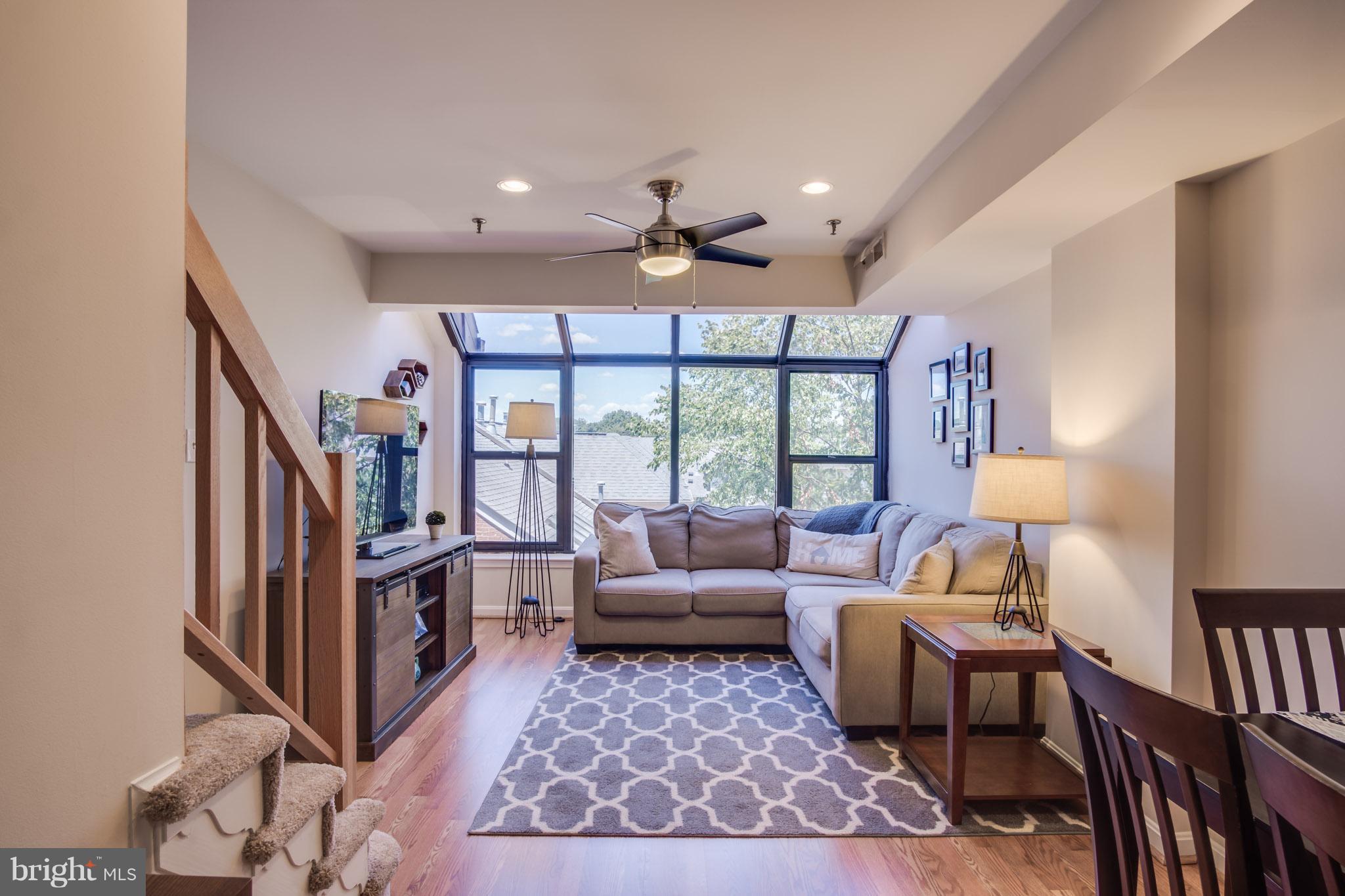 1029 North Stuart Street, Unit 511 Arlington, VA 22201 - Photo 11 of 23 Family Room With Wall of Windows