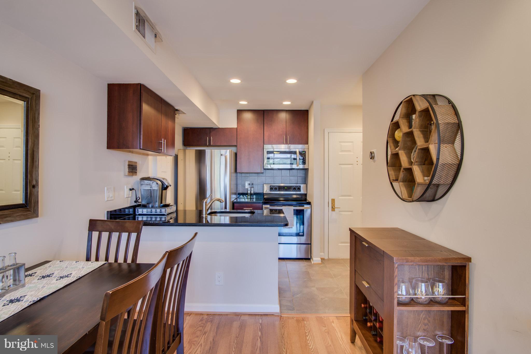 1029 North Stuart Street, Unit 511 Arlington, VA 22201 - Photo 5 of 23 Kitchen With Large Walk-In Pantry/Closet